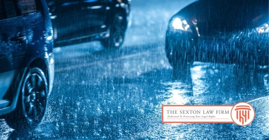 Cars driving in heavy rain