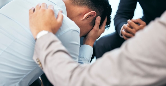 distressed man at work