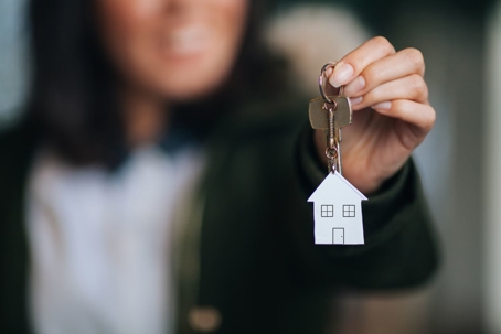 Woman holding a house key