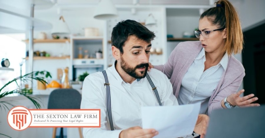 couple looking at debt