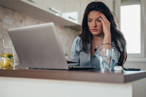 stressed woman considering bankruptcy options